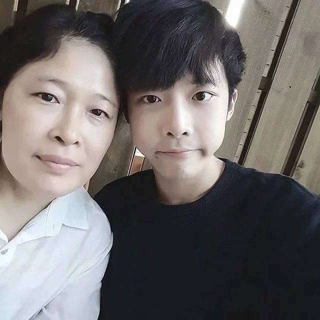 梁贤妹坚